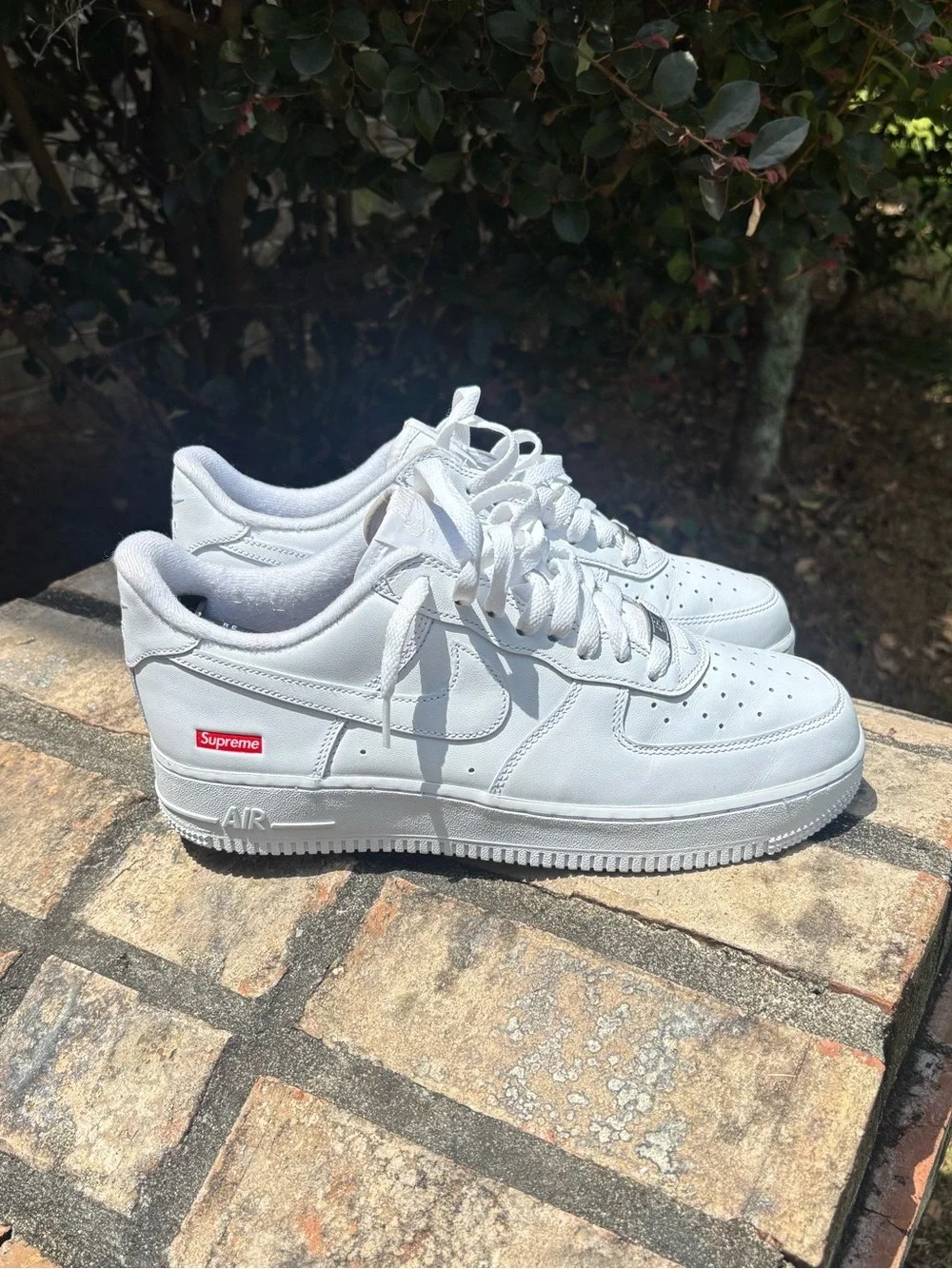 Nike White Low-Top Leather Sneaker with Red Supreme Box Logo